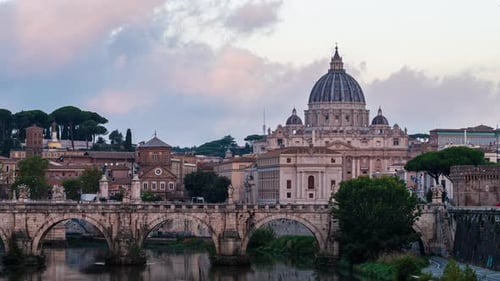 Rome Skyline with the famous Vatican St Peter Basilica and St Angelo Bridge at sunrise