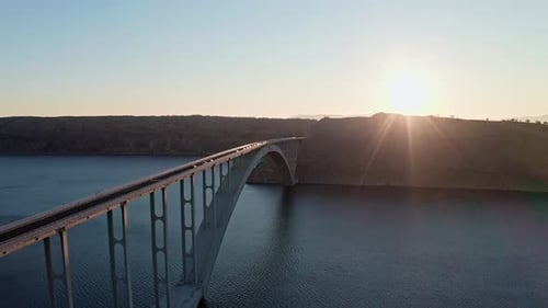 Drone shot of the bridge and ocean in the sunset 3