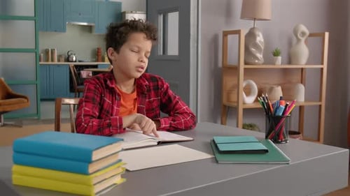 Troubled Tired Teenage African American Kid Asking for Help During Study at Home