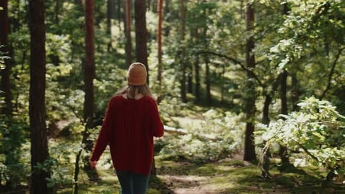 Beautiful Young Woman Walking in the Forest Relaxing Meditating and Finding a Peace in the Nature