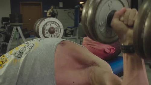 Athletes train in the gym to compete in bodybuilding close-up