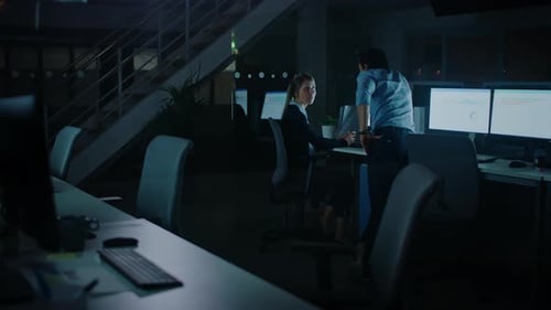Confident Businessman Uses Desktop Computer, Her Male Manager Explains Specific Tasks, Account Hand
