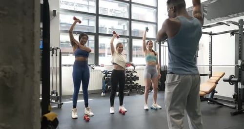 Group Fitness Class with Young Adult Women