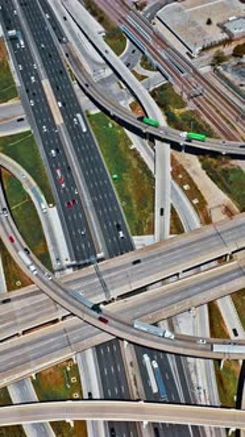 Aerial view of highway intersections in Dallas showcasing urban traffic