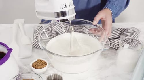Step By Step Preparing Homemade Chocolate Ice Cream in a Hand Kitchen Mixer