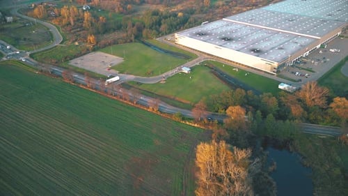Aerial view of warehouse storages or industrial factory or logistics center from above. Aerial view