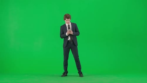 Portrait of Male Model in Suit on Chroma Key Green Screen Handsome Young Businessman in Trendy Suit