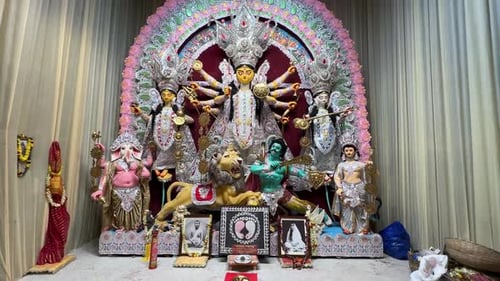 Hindu Religious Figures and Deities in a Festive Setting