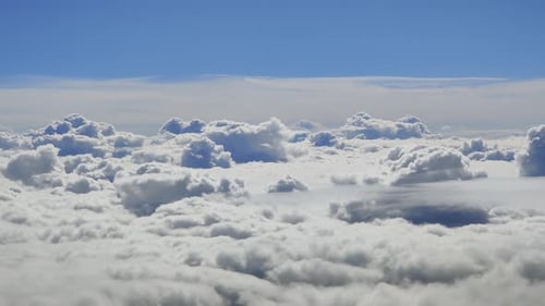 Majestic Aerial View of Fluffy White Clouds