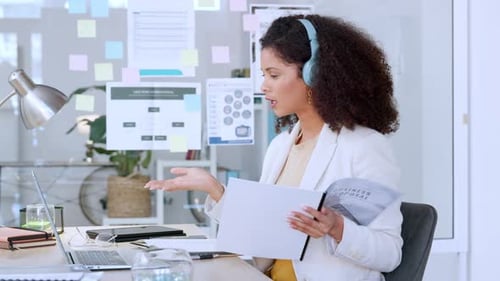 Business Woman in Virtual Meeting at Workplace