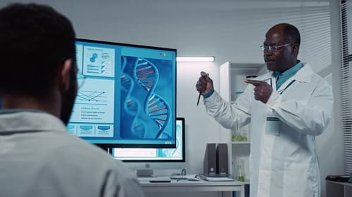 Scientists Discussing DNA Analysis in Laboratory