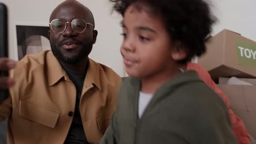 Happy Family Taking Selfie with Smartphone at Home