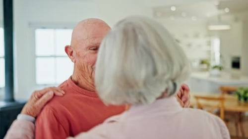 Elderly Couple Dancing Together with Love in Home