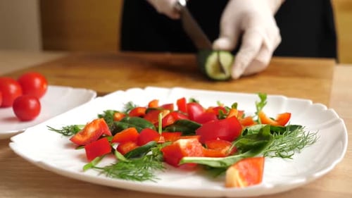 Preparing Fresh Vegetable Salad in a Kitchen