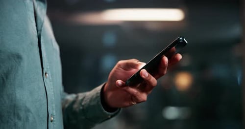 Hands, smartphone and texting at night in office with mobile networking