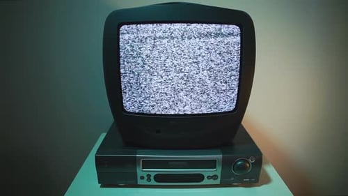 Dated TV with Screen Noise Nostalgic Nineties Retro Technology Concept