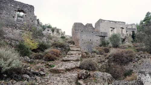 Traveller exploring the ancient Greek village of Kayakoy