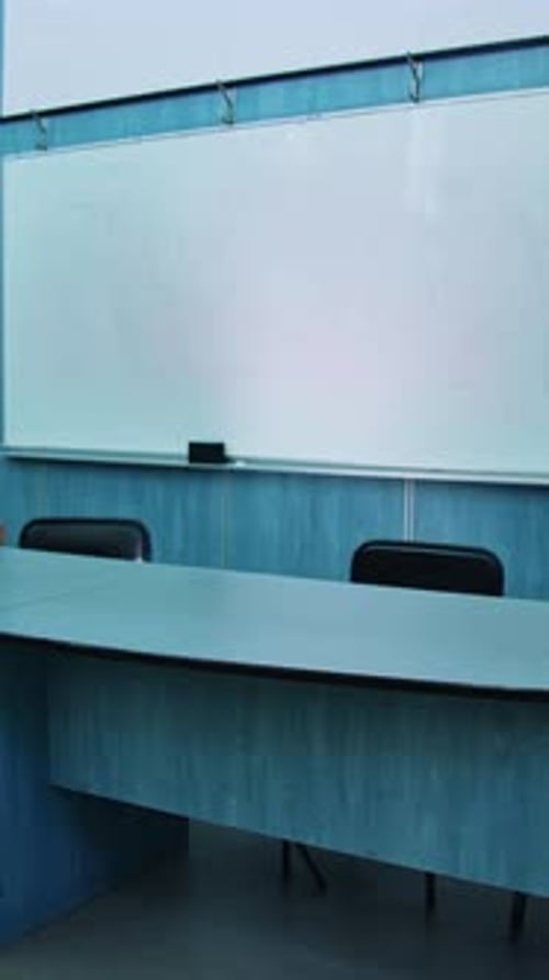 Presidium place with modern equipment. Auditorium with a blackboard, white board and teacher's table