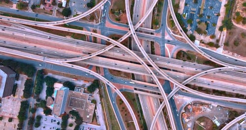 Transport moves non-stop by the intertwining highways and trestles in the multi-level interchange.