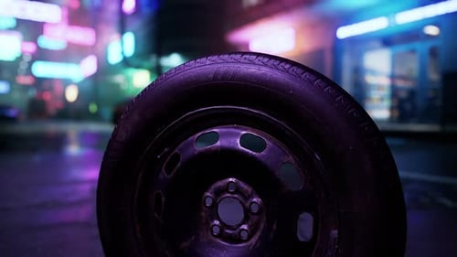 A Close Up of a Tire on a City Street