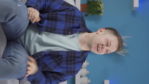 Vertical video of Portrait of man feeling excited.
