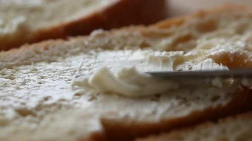 Close Up of Butter Spread on a Bread