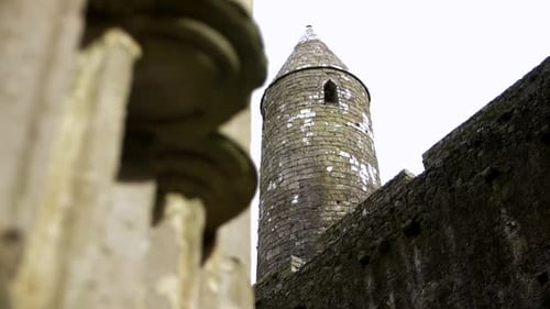 Slider shot left to right of old stone tower, Rock of Cashel Castle, Ireland.