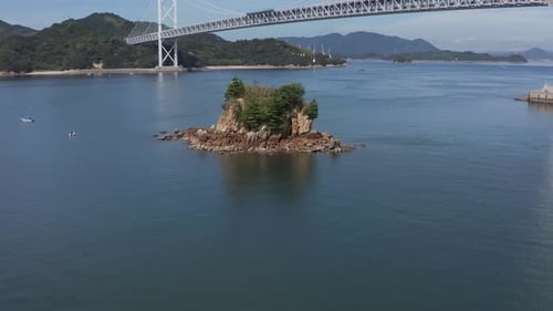 Tilt reveal of Beautiful Bridge over Japans inland Sea, Shimanami Kaido