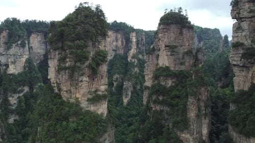 Majestic Karst Mountains Covered in Trees and Foliage