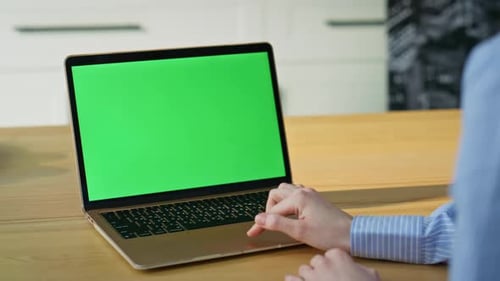Hands Using Touchpad Chroma Key Laptop Surfing Online at Home Apartment Closeup
