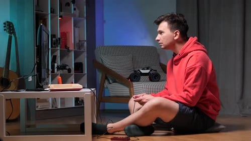 Man Playing Retro Video Game