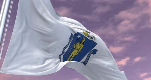 Massachusetts State Flag Waving Against Cloudy Sky