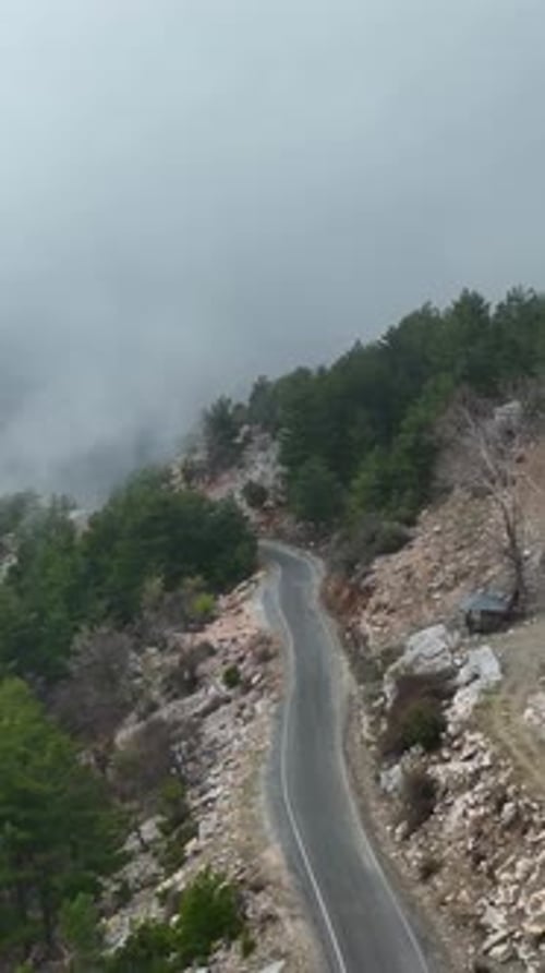 Vertical Video Cloudy Landscape in the Mountains Aerial View