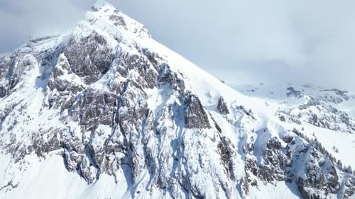 Aerial Shot Of Magnificent Fronalpstock Glarus Snowy Mountains, Switzerland
