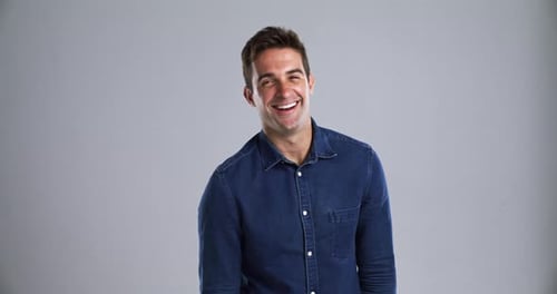 Man, face and happy smile in studio for casual confidence for relax cool