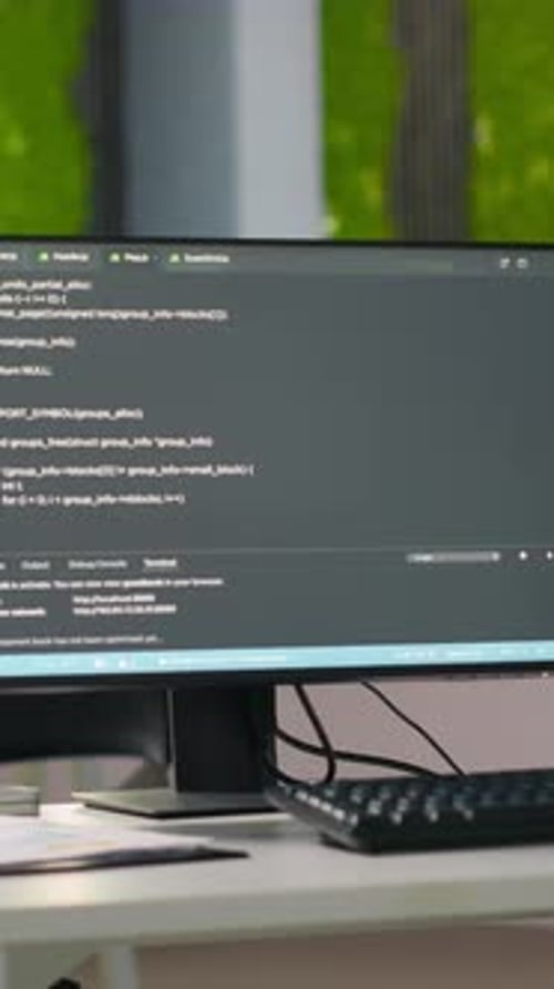 Vertical Video PC Screens on Office Desk Used to Design and Implement AI Algorithms