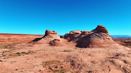 Distancing from the incredible whimsically-shaped rocks in the desert.
