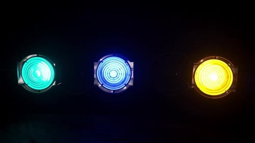 Abstract Circular Lights Pulsing in Dark Background