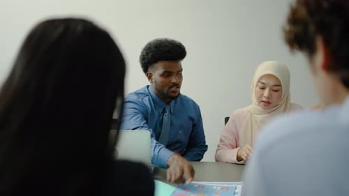 Business Meeting with Colleagues in Modern Office