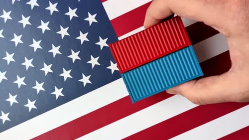 Shipping Container Toys Placed on American Flag Backdrop