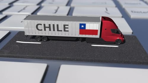 Camión con bandera de Chile se mueve en la tecla del teclado