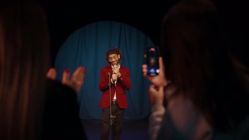 Popular Male Comedian Performing and Ladies Filming His By Smartphones Closeup Visitors of Trendy
