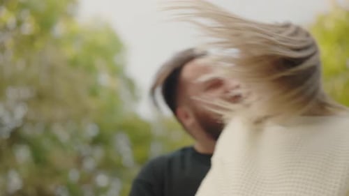 Loving Couple Laughing Together in Nature