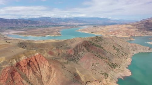 Aerial View Of Dam Lake And Mountains