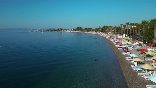 Beautiful view of the beach with boats, pure nature, sea and ships. Shot from a drone