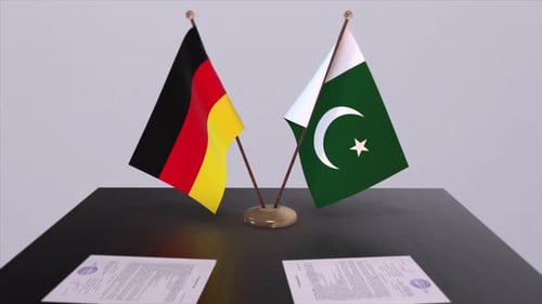 Flags of Germany and Pakistan on Table