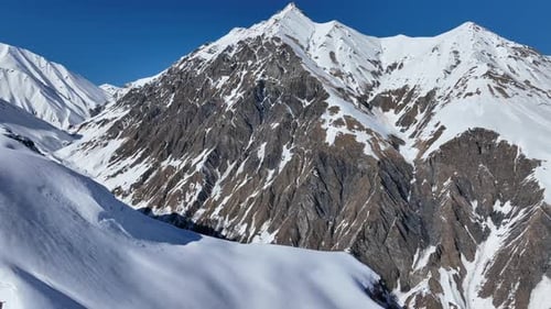 Aerial view of beautiful snowy mountains in Gudauri, Georgia