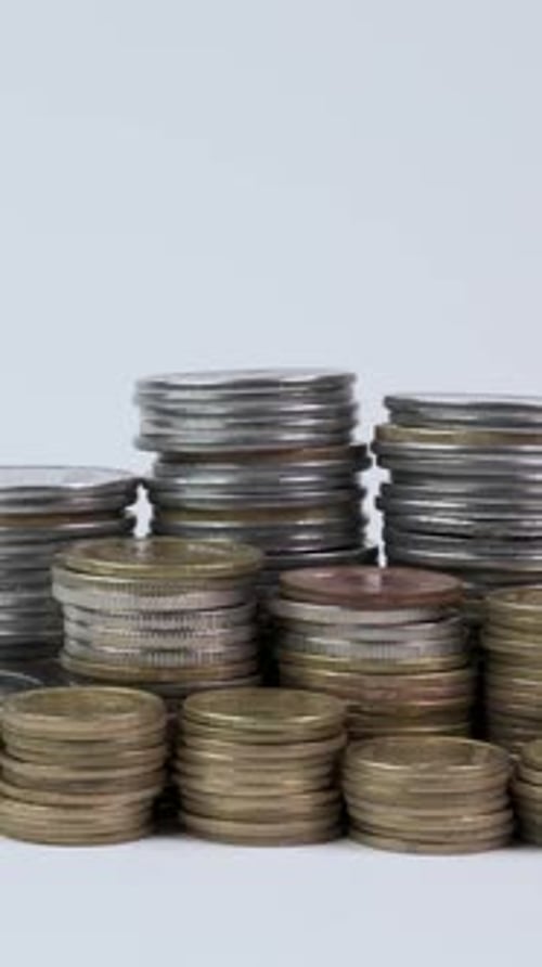 Rising towers of shiny currency