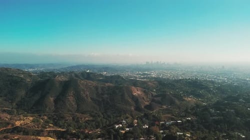 Wide Drone Shot Over Hills and Mountains Near Los Angeles California on Sunny Day