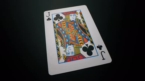 Close-Up of a Single Poker Card on Black Surface